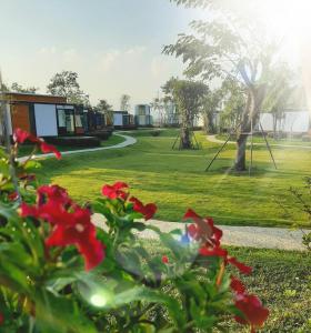 a view of a park with a swing at AKKARA RESORT&VILLA in Chiang Rai