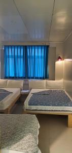 Llit o llits en una habitació de New hoover hostel