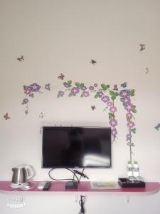 TV a/nebo společenská místnost v ubytování Jiou Wu Siao Jhu