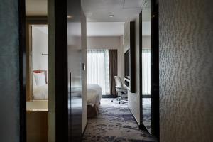 Rúm í herbergi á Tango Inn Taipei ZhongShan