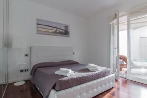 מיטה או מיטות בחדר ב-Venturini Guest House Self Check-in