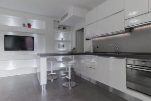 Virtuvė arba virtuvėlė apgyvendinimo įstaigoje Venturini Guest House Self Check-in