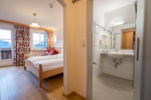 Cama o camas de una habitación en Hotel-Garni Schernthaner