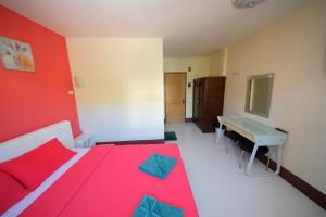 Postel nebo postele na pokoji v ubytování Pineapple Guesthouse