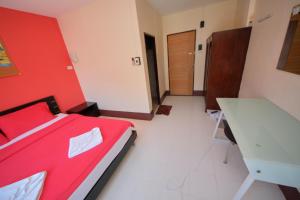 Postel nebo postele na pokoji v ubytování Pineapple Guesthouse