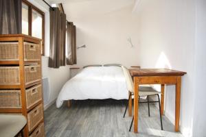 Postel nebo postele na pokoji v ubytování LE GÎTE LES MELEZES