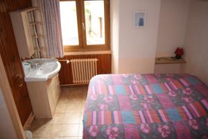 Postel nebo postele na pokoji v ubytování LE GÎTE LES MELEZES