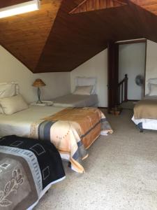 Postel nebo postele na pokoji v ubytování Riverfront Homestay
