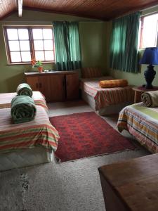 Postel nebo postele na pokoji v ubytování Riverfront Homestay
