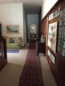 Postel nebo postele na pokoji v ubytování Riverfront Homestay