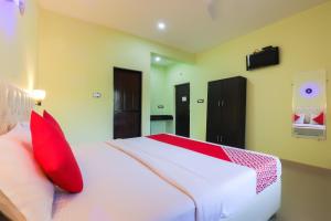 Ein Bett oder Betten in einem Zimmer der Unterkunft Hotel Lalit Royal Ashvem