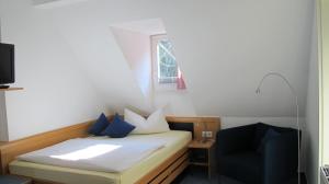 Postel nebo postele na pokoji v ubytování Hotel Anlage Heidelberg