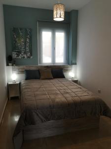 Posteľ alebo postele v izbe v ubytovaní Piso Sevilla