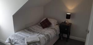 Ένα ή περισσότερα κρεβάτια σε δωμάτιο στο Lime Cottage Short Term Accommodation Digs