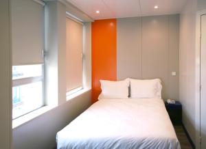 Cama o camas de una habitación en iStay Hotel Porto Centro
