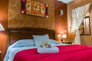 Postel nebo postele na pokoji v ubytování Hotel Mayahau Coba