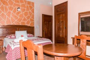 Postel nebo postele na pokoji v ubytování Hotel Mayahau Coba