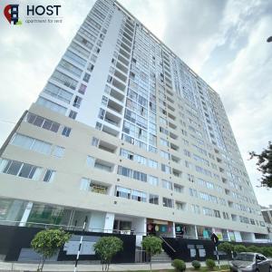 a large white building with a lot of windows at Host - San Isidro Sta Catalina in Lima