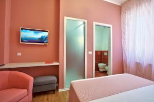 A television and/or entertainment centre at B&B Del Corso