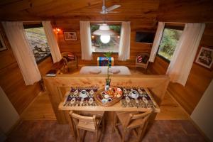 an overhead view of a dining table in a cabin at Akapana Suites in Villa Berna