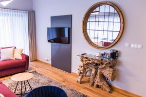 Telewizja i/lub zestaw kina domowego w obiekcie Aparthotel Inspire Miodova Residence