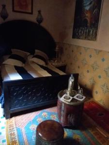 Voodi või voodid majutusasutuse RIAD MAKENE MOUCHKILL toas
