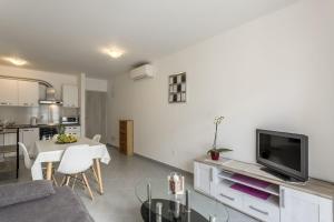 Kuchyň nebo kuchyňský kout v ubytování COOL APARTMAN
