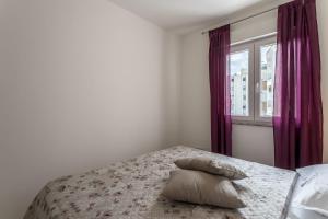 Postel nebo postele na pokoji v ubytování COOL APARTMAN