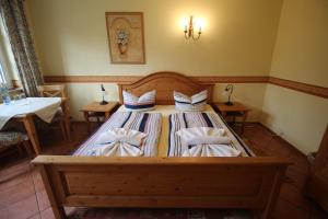 Postel nebo postele na pokoji v ubytování Landhaus Alt Reddevitz