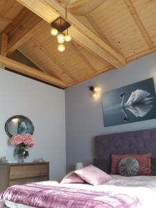 Posteľ alebo postele v izbe v ubytovaní Caldera Premium Villa
