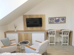 TV a/nebo společenská místnost v ubytování Apartmán v Harmonii 3 patro