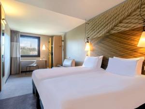 Posteľ alebo postele v izbe v ubytovaní ibis Budapest Castle Hill
