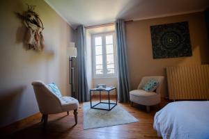 Łóżko lub łóżka w pokoju w obiekcie Gîte entre Bordeaux et Saint-Emilion