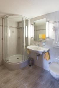 Koupelna v ubytování Hotel Portjengrat + 37 fotografií