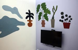 TV a/nebo společenská místnost v ubytování Just Inn Xin Yi 正旅館 信義