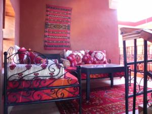 Postel nebo postele na pokoji v ubytování Kasbah Petit Nomade
