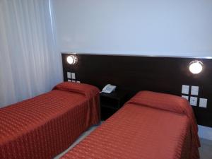 Postel nebo postele na pokoji v ubytování Hotel Nontue Abasto Buenos Aires