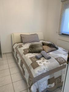 Postel nebo postele na pokoji v ubytování Vida Real Estate Feucht