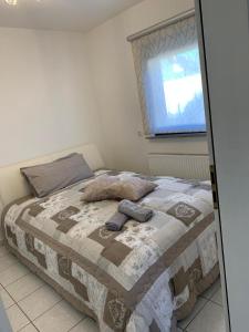 Postel nebo postele na pokoji v ubytování Vida Real Estate Feucht
