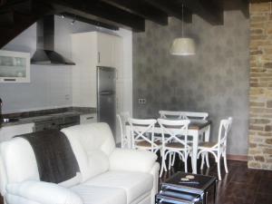 Ein Sitzbereich in der Unterkunft Casa Rural Manuel de Pepa Xuaca