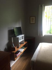 TV a/nebo společenská místnost v ubytování Casa Piabanha - Centro Histórico