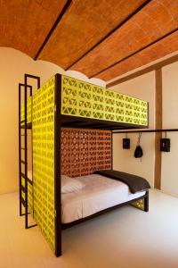 a bedroom with a bunk bed in a room at Downtown Beds in Mexico City
