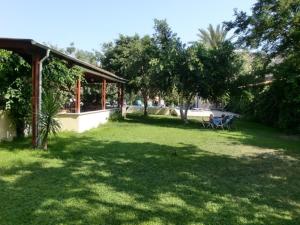 Zahrada ubytování Hotel Neos Matala