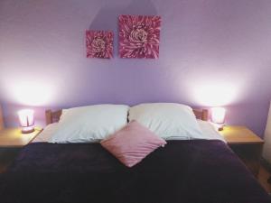 Letto o letti in una camera di Apartment Sučić