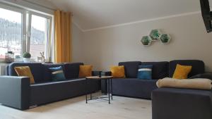 Posedenie v ubytovaní Apartamenty Perła Szczyrku