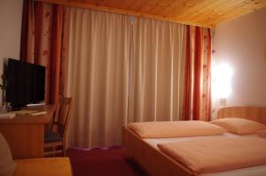 Postelja oz. postelje v sobi nastanitve Hotel Burtschahof