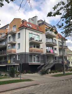Budova, v ktorej sa apartmán nachádza + 13 fotografií