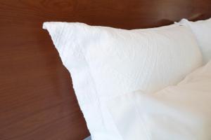 Postel nebo postele na pokoji v ubytování Hotel Miramar - São Pedro de Moel