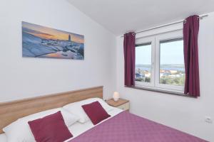 Posteľ alebo postele v izbe v ubytovaní Villa Bobic + 37 fotografií