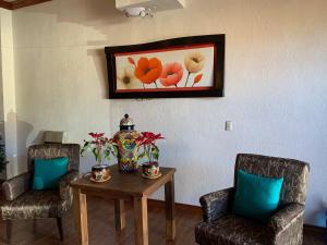 Posezení v ubytování Hotel Los Arcos